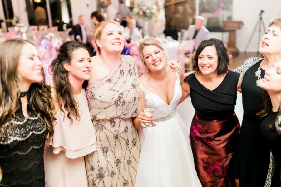 Bride enjoying the reception with her friends and family