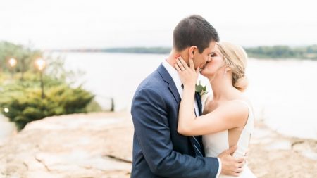 Bride and groom kissing at a wedding venue in Missouri