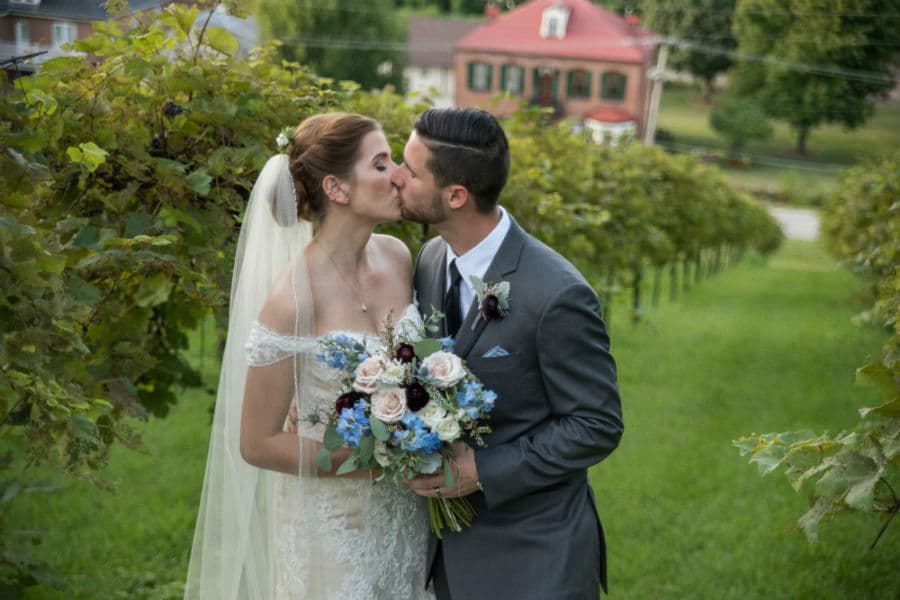 Bride and groom kiss