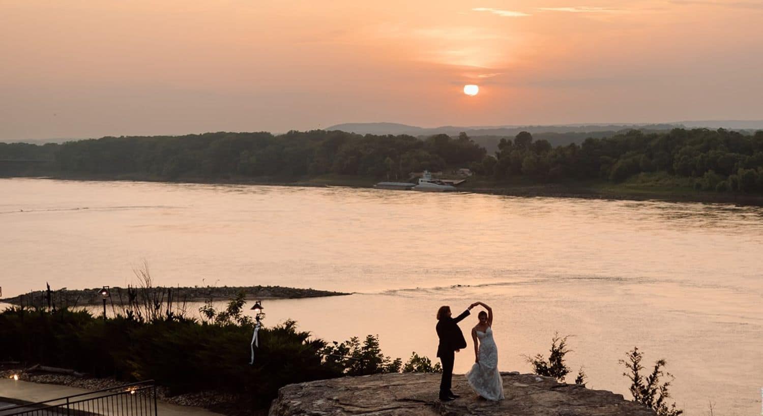 Bride and Groom dancing at Sunset