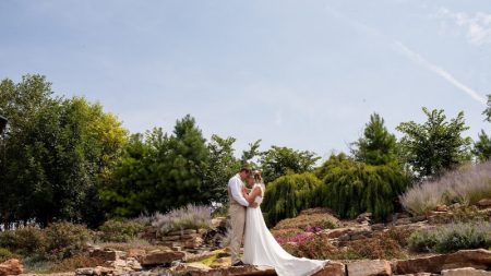 Missouri Wedding Venue: Couple kissing next to little waterfall